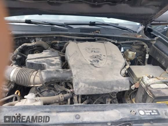 2018 Toyota Tacoma SR5 with VIN 5TFAZ5CN2JX061728, listed as a IAAI auction lot 42775812 with 119,408 mi miles and . Bid and sale history available at DreamBid. Image 10.