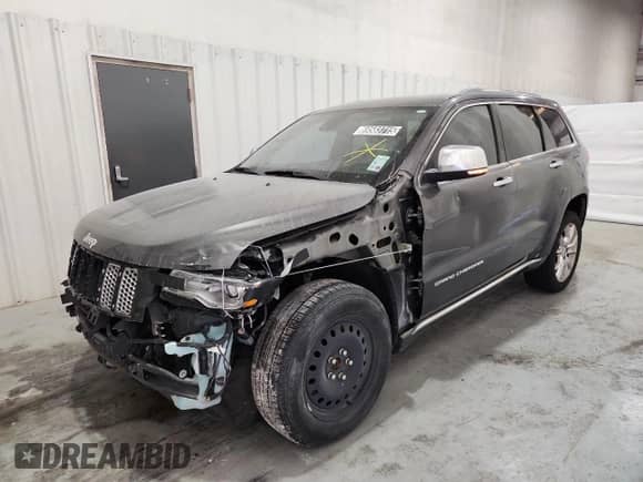 2014 Jeep Grand Cherokee Summit with VIN 1C4RJFJT8EC268672, listed as a Copart auction lot 69583715 with 157,725 mi miles and Clean title. Bid and sale history available at DreamBid. Image 1.