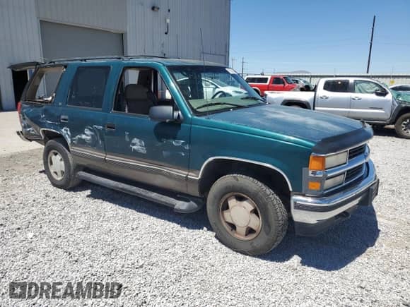 1997 Chevrolet Tahoe с VIN 1GNEK13R0VJ437621, выставлен на аукционе Copart как лот 52763335 с пробегом 147 522 миль миль и Списание • Salvage title. История ставок и продаж доступна на DreamBid. Изображение 4.