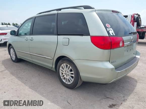 2009 Toyota Sienna XLE with VIN 5TDZK22C99S288258, listed as a IAAI auction lot 42965405 with 121,883 mi miles and . Bid and sale history available at DreamBid. Image 3.