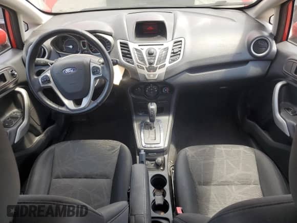 2012 Ford Fiesta SES с VIN 3FADP4FJ7CM173946, выставлен на аукционе Copart как лот 58439135 с пробегом 79 245 миль миль и Списание • Salvage title. История ставок и продаж доступна на DreamBid. Изображение 8.