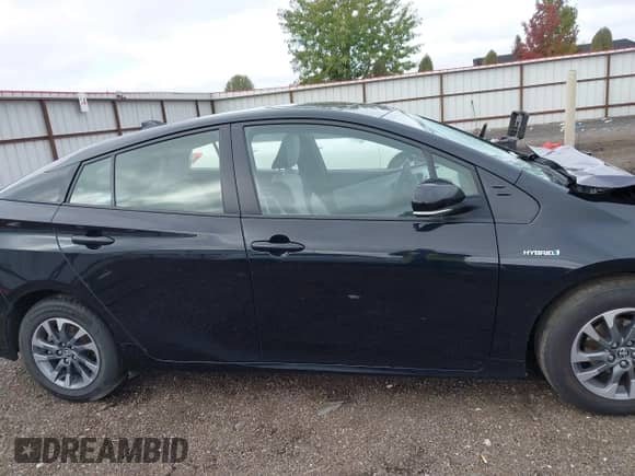 2022 Toyota Prius LE with VIN JTDKAMFU3N3187036, listed as a IAAI auction lot 43493399 with 98,731 mi miles and . Bid and sale history available at DreamBid. Image 14.