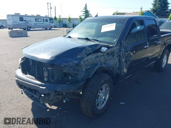 2011 Chevrolet Colorado 1LT z VIN 1GCHTCFE2B8115945, wystawiony jako IAAI lot #42314389 z przebiegiem 250 571 mil mil oraz . Historia ofert i sprzedaży dostępna na DreamBid. Obrazek 6.