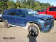 2025 Chevrolet Traverse AWD Z71 z VIN 1GNEVJRS8SJ194895, wystawiony jako Copart lot #84440345 z przebiegiem 5 613 mil mil oraz Czysty tytuł • Clean title. Historia ofert i sprzedaży dostępna na DreamBid. Obrazek 4.