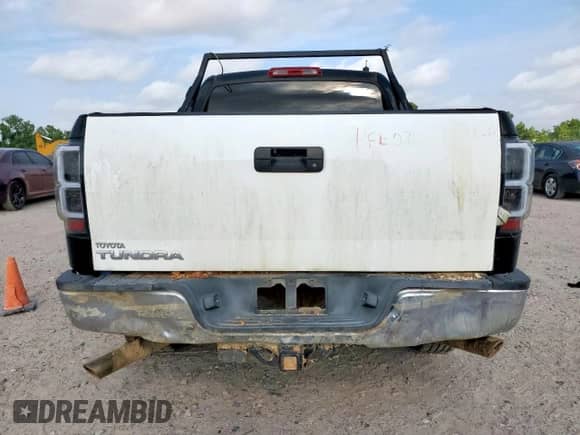 2012 Toyota Tundra with VIN 5TFEY5F12CX121183, listed as a Copart auction lot 57284005 with 381,527 mi miles and Clean title. Bid and sale history available at DreamBid. Image 6.