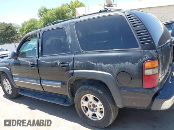 2002 Chevrolet Tahoe LT с VIN 1GNEK13Z02J246082, выставлен на аукционе IAAI как лот 42506824 с пробегом 300 992 миль миль и . История ставок и продаж доступна на DreamBid. Изображение 13.