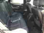 2015 BMW 4 Series 428i xDrive z VIN WBA4C9C54FD330937, wystawiony jako Copart lot #66156155 z przebiegiem 104 805 mil mil oraz Szkoda całkowita • Salvage title. Historia ofert i sprzedaży dostępna na DreamBid. Obrazek 10.