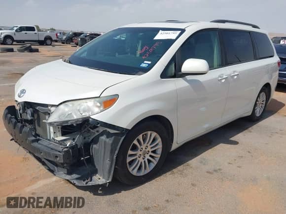 2015 Toyota Sienna XLE with VIN 5TDYK3DC2FS682520, listed as a IAAI auction lot 42501795 with 101,477 mi miles and . Bid and sale history available at DreamBid. Image 2.