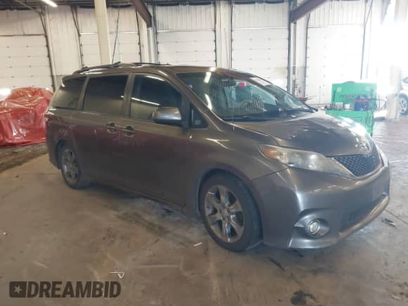 2011 Toyota Sienna SE with VIN 5TDXK3DC7BS034516, listed as a IAAI auction lot 41539955 with 209,309 mi miles and . Bid and sale history available at DreamBid. Image 1.