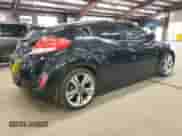 2013 Hyundai Veloster w/Black Int z VIN KMHTC6AD3DU111385, wystawiony jako Copart lot #86124085 z przebiegiem 144 014 mil mil oraz Czysty tytuł • Clean title. Historia ofert i sprzedaży dostępna na DreamBid. Obrazek 3.