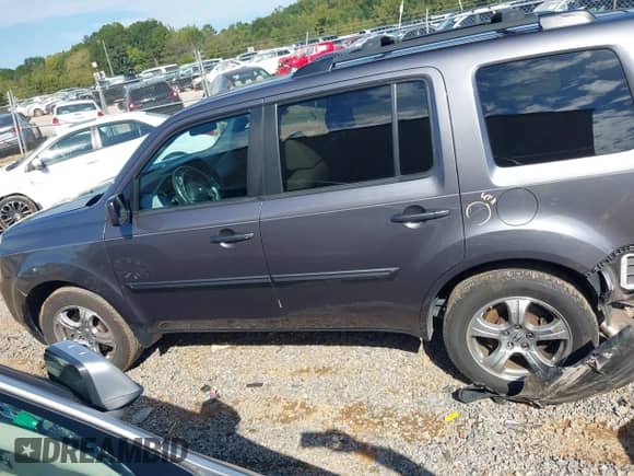 2014 Honda Pilot EX-L z VIN 5FNYF4H58EB016710, wystawiony jako IAAI lot #43349794 z przebiegiem 163 710 mil mil oraz . Historia ofert i sprzedaży dostępna na DreamBid. Obrazek 14.