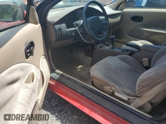 2001 Saturn SC with VIN 1G8ZY12791Z233074, listed as a Copart auction lot 60476085 with 130,323 mi miles and Salvage title. Bid and sale history available at DreamBid. Image 8.
