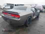 2012 Dodge Challenger SRT-8 392 with VIN 2C3CDYCJ5CH122880, listed as a IAAI auction lot 42165109 with 103,973 mi miles and . Bid and sale history available at DreamBid. Image 4.