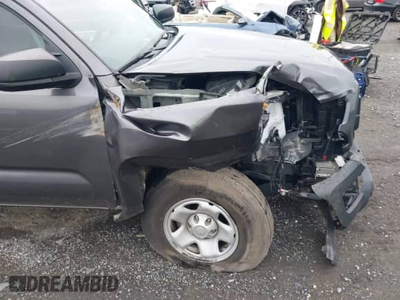 2023 Toyota Tacoma SR with VIN 3TYSX5EN6PT021792, listed as a IAAI auction lot 43037546 with 20,673 mi miles and . Bid and sale history available at DreamBid. Image 6.