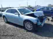 2013 Chrysler 300 with VIN 2C3CCARG0DH592063, listed as a IAAI auction lot 41931461 with 74,965 mi miles and . Bid and sale history available at DreamBid. Image 1.