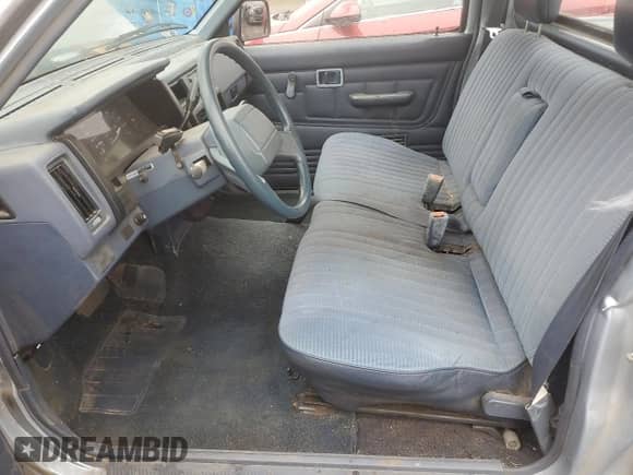 1991 Nissan Frontier z VIN 1N6SD11SXMC311083, wystawiony jako Copart lot #83971835 z przebiegiem 112 789 mil mil oraz Szkoda całkowita • Salvage title. Historia ofert i sprzedaży dostępna na DreamBid. Obrazek 7.