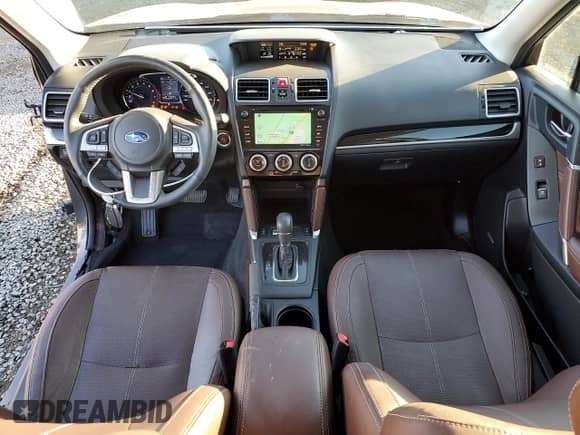 2017 Subaru Forester Touring with VIN JF2SJGWCXHH577360, listed as a Copart auction lot 86335595 with 75,471 mi miles and Salvage title. Bid and sale history available at DreamBid. Image 8.