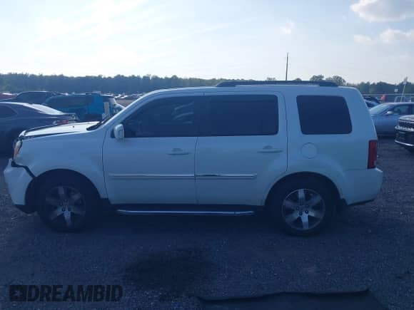 2015 Honda Pilot Touring z VIN 5FNYF4H99FB068609, wystawiony jako IAAI lot #43262856 z przebiegiem 184 790 mil mil oraz . Historia ofert i sprzedaży dostępna na DreamBid. Obrazek 14.