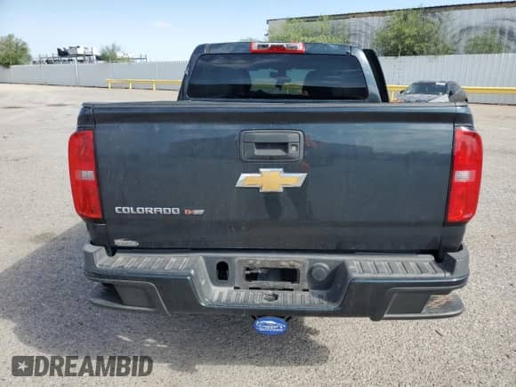 2018 Chevrolet Colorado 2WD Work Truck с VIN 1GCGSBEN9J1182530, выставлен на аукционе Copart как лот 61832225 с пробегом 74 668 миль миль и Списание • Salvage title. История ставок и продаж доступна на DreamBid. Изображение 6.