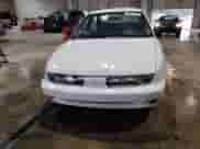 1997 Saturn SL с VIN 1G8ZK5272VZ252757, выставлен на аукционе Copart как лот 70937785 с пробегом 166 639 миль миль и Списание • Salvage title. История ставок и продаж доступна на DreamBid. Изображение 5.