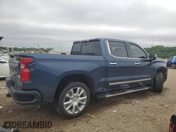 2023 Chevrolet Silverado 1500 High Country with VIN 1GCUDJE82PZ241915, listed as a Copart auction lot 65246765 with 61,743 mi miles and Salvage title. Bid and sale history available at DreamBid. Image 3.