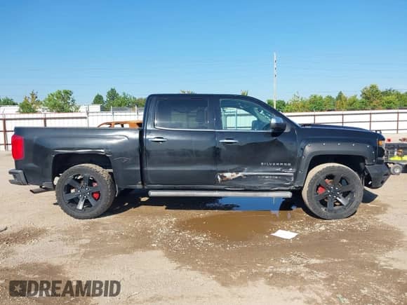 2017 Chevrolet Silverado 1500 LTZ z VIN 3GCUKSEJ5HG490158, wystawiony jako IAAI lot #43144365 z przebiegiem 184 956 mil mil oraz . Historia ofert i sprzedaży dostępna na DreamBid. Obrazek 13.