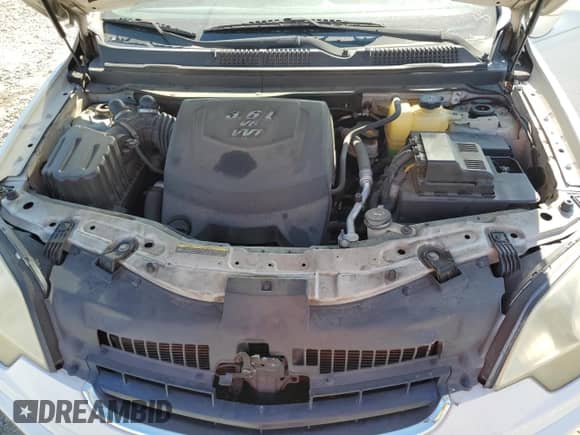 2008 Saturn VUE XR z VIN 3GSCL53718S671356, wystawiony jako Copart lot #68237084 z przebiegiem 131 882 mil mil oraz Szkoda całkowita • Salvage title. Historia ofert i sprzedaży dostępna na DreamBid. Obrazek 13.