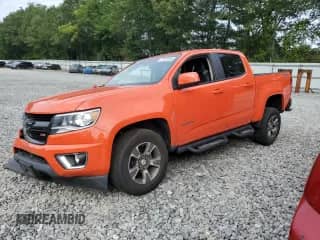 2020 Chevrolet Colorado 4WD Z71 with VIN 1GCGTDENXL1145837, listed as a Copart auction lot 70972395 with 56,005 mi miles and Salvage title. Bid and sale history available at DreamBid. Image 1.