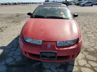 1999 Saturn SC с VIN 1G8ZY127XXZ314531, выставлен на аукционе Copart как лот 49653805 с пробегом 130 457 миль миль и Списание • Salvage title. История ставок и продаж доступна на DreamBid. Изображение 5.