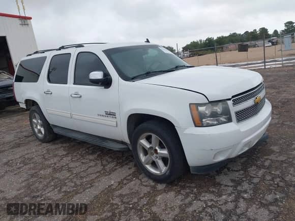 2013 Chevrolet Suburban LS with VIN 1GNSCHE05DR163615, listed as a IAAI auction lot 42633280 with 198,782 mi miles and . Bid and sale history available at DreamBid. Image 13.