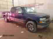 2001 Chevrolet Silverado 1500 LS z VIN 1GCEK19T81E219084, wystawiony jako Copart lot #80954195 z przebiegiem 216 520 mil mil oraz Czysty tytuł • Clean title. Historia ofert i sprzedaży dostępna na DreamBid. Obrazek 4.