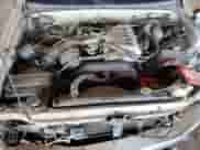 2001 Toyota Tacoma PreRunner z VIN 5TEGN92N71Z859665, wystawiony jako Copart lot #84799325 z przebiegiem 202 008 mil mil oraz Szkoda całkowita • Salvage title. Historia ofert i sprzedaży dostępna na DreamBid. Obrazek 11.