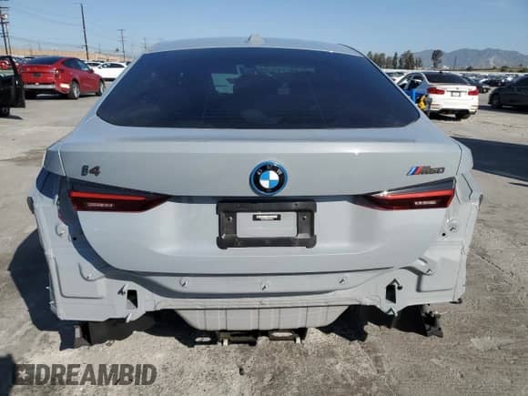 2023 BMW i4 M50 with VIN WBY33AW00PFR00503, listed as a Copart auction lot 51310605 with 8,332 mi miles and Salvage title. Bid and sale history available at DreamBid. Image 6.