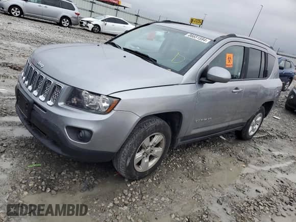 2017 Jeep Compass Latitude with VIN 1C4NJCEA9HD116419, listed as a Copart auction lot 86651594 with 140,373 mi miles and Salvage title. Bid and sale history available at DreamBid. Image 1.