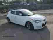 2013 Hyundai Veloster w/Gray Int z VIN KMHTC6AD4DU108401, wystawiony jako Copart lot #84835955 z przebiegiem 125 851 mil mil oraz Szkoda całkowita • Salvage title. Historia ofert i sprzedaży dostępna na DreamBid. Obrazek 4.