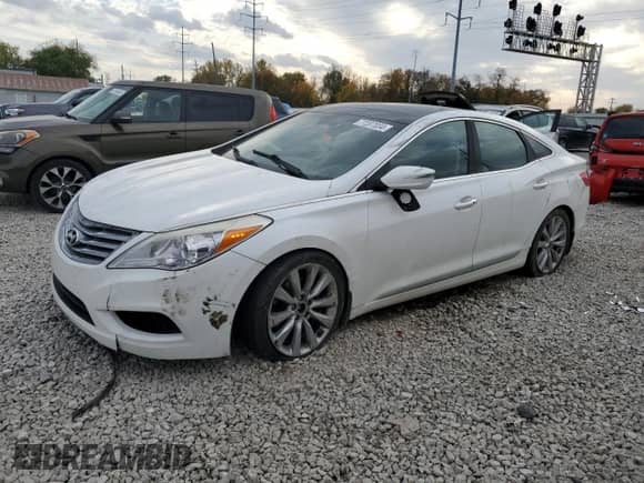 2012 Hyundai Azera с VIN KMHFH4JG4CA193222, выставлен на аукционе Copart как лот 77207034 с пробегом 150 634 миль миль и Списание • Salvage title. История ставок и продаж доступна на DreamBid. Изображение 1.