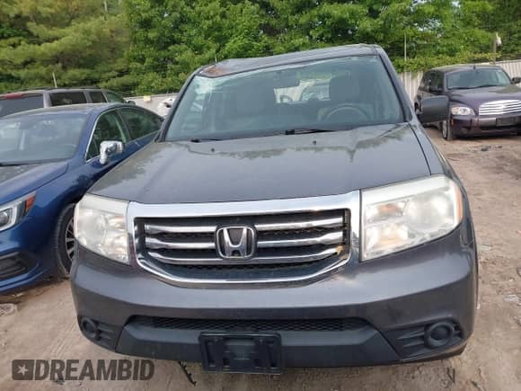 2015 Honda Pilot LX with VIN 5FNYF4H24FB013455, listed as a IAAI auction lot 42409520 with 152,718 mi miles and . Bid and sale history available at DreamBid. Image 12.