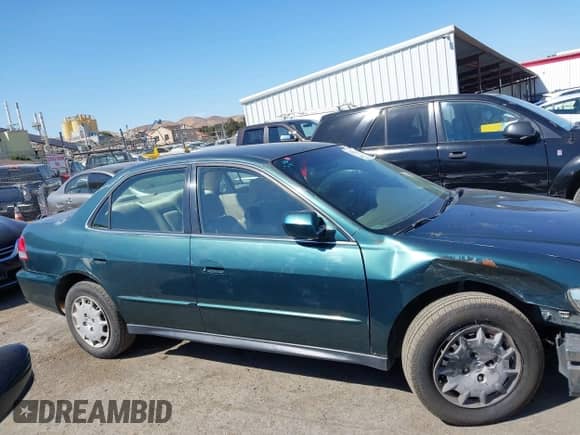 2002 Honda Accord LX with VIN JHMCG66522C014027, listed as a IAAI auction lot 42910646 with 225,058 mi miles and . Bid and sale history available at DreamBid. Image 13.