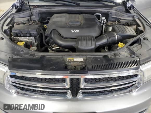 2014 Dodge Durango SXT with VIN 1C4RDJAG1EC381490, listed as a Copart auction lot 87370085 with 128,870 mi miles and Salvage title. Bid and sale history available at DreamBid. Image 12.