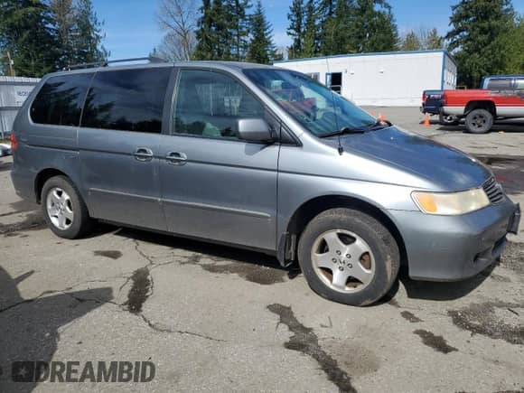 1999 Honda Odyssey EX с VIN 2HKRL1863XH009222, выставлен на аукционе Copart как лот 50364505 с пробегом 160 416 миль миль и Чистый • Clean title. История ставок и продаж доступна на DreamBid. Изображение 4.