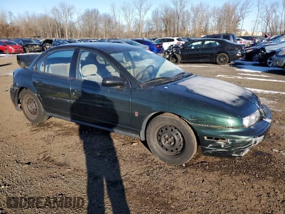 1996 Saturn SL with VIN 1G8ZK5279TZ274736, listed as a Copart auction lot 42434145 with 93,315 mi miles and Salvage title. Bid and sale history available at DreamBid. Image 4.
