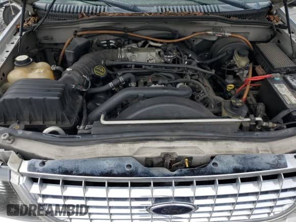 2004 Ford Explorer XLT с VIN 1FMZU63W34UB13076, выставлен на аукционе Copart как лот 82584105 с пробегом 209 421 миль миль и Списание • Salvage title. История ставок и продаж доступна на DreamBid. Изображение 12.