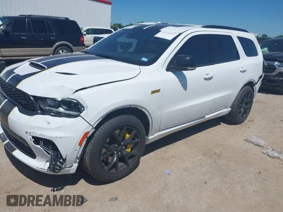 2024 Dodge Durango SRT 392 Plus with VIN 1C4SDJGJ1RC220602, listed as a IAAI auction lot 42235297 with 4,950 mi miles and . Bid and sale history available at DreamBid. Image 2.