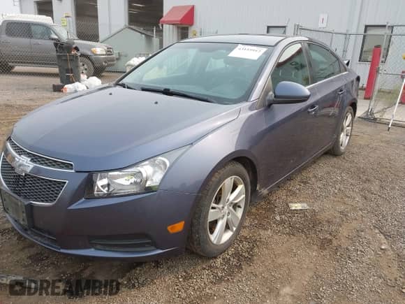 2014 Chevrolet Cruze Diesel with VIN 1G1P75SZ9E7100432, listed as a IAAI auction lot 43155912 with 204,206 mi miles and . Bid and sale history available at DreamBid. Image 17.
