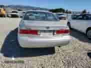 2000 Toyota Camry LE with VIN 4T1BF22K7YU112165, listed as a Copart auction lot 82239315 with 408,519 mi miles and Salvage title. Bid and sale history available at DreamBid. Image 6.