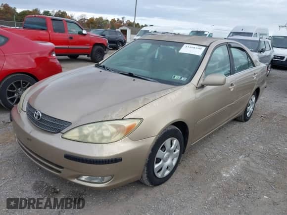 2002 Toyota Camry LE with VIN 4T1BE32K92U069870, listed as a IAAI auction lot 43498390 with 137,376 mi miles and . Bid and sale history available at DreamBid. Image 2.
