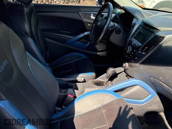 2013 Hyundai Veloster Turbo с VIN KMHTC6AE3DU097576, выставлен на аукционе Copart как лот 82102005 с пробегом 140 467 миль миль и Чистый • Clean title. История ставок и продаж доступна на DreamBid. Изображение 5.