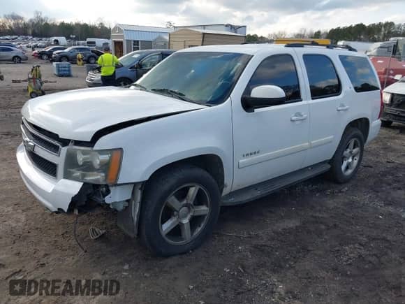 2009 Chevrolet Tahoe 1LT z VIN 1GNEC23359R233645, wystawiony jako IAAI lot #41541396 z przebiegiem 201 830 mil mil oraz . Historia ofert i sprzedaży dostępna na DreamBid. Obrazek 17.