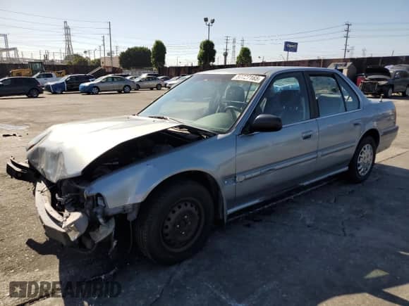 1990 Honda Accord LX with VIN JHMCB7652LC076386, listed as a Copart auction lot 57727165 with 245,375 mi miles and Salvage title. Bid and sale history available at DreamBid. Image 1.