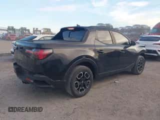 2022 Hyundai Santa Cruz SEL z VIN 5NTJC4AE1NH000209, wystawiony jako IAAI lot #43280171 z przebiegiem 65 611 mil mil oraz . Historia ofert i sprzedaży dostępna na DreamBid. Obrazek 4.